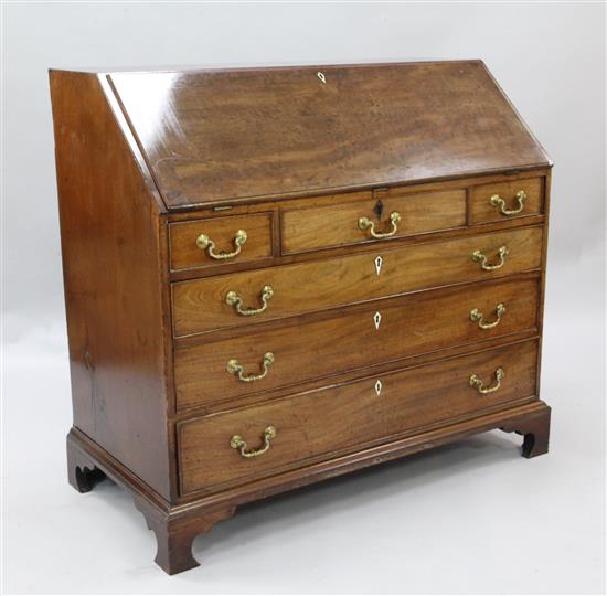 A George III mahogany bureau, W.3ft 10in. D.1ft 11in. H.3ft 6in.